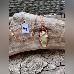 Green iridescent stone - yet to be identified